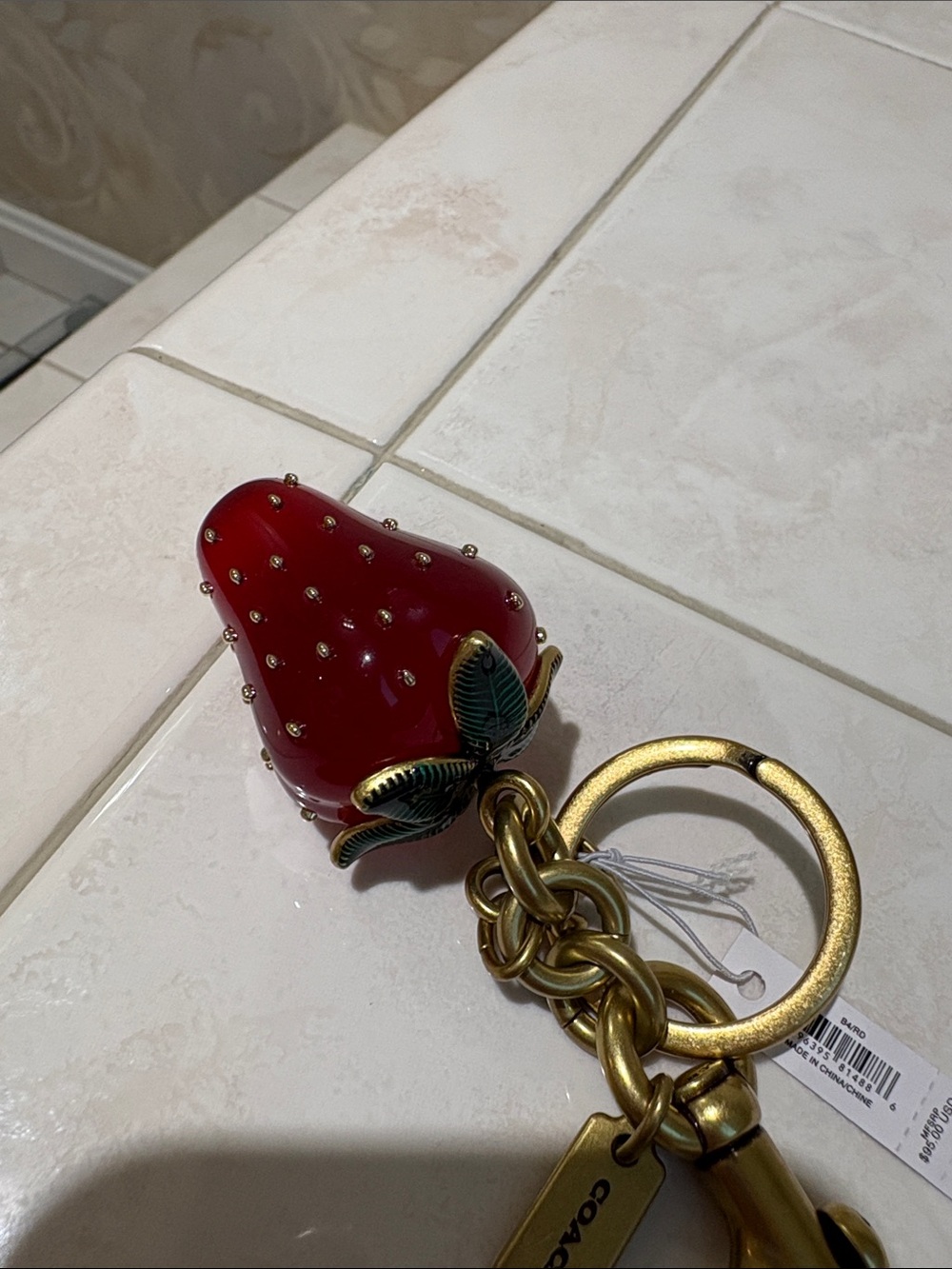 Coach Gold-Tone Strawberry Charm Keychain with Red Enamel Berry - Picture 5 of 5